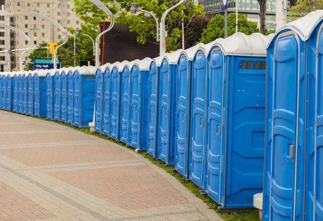 a row of portable restrooms at an outdoor special event, ready for use in Aguanga CA